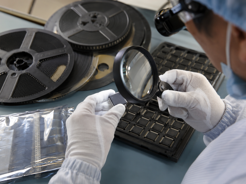 How to Source IC Chips from China with Lower Risk 2 Worker Inspecting An IC Chip